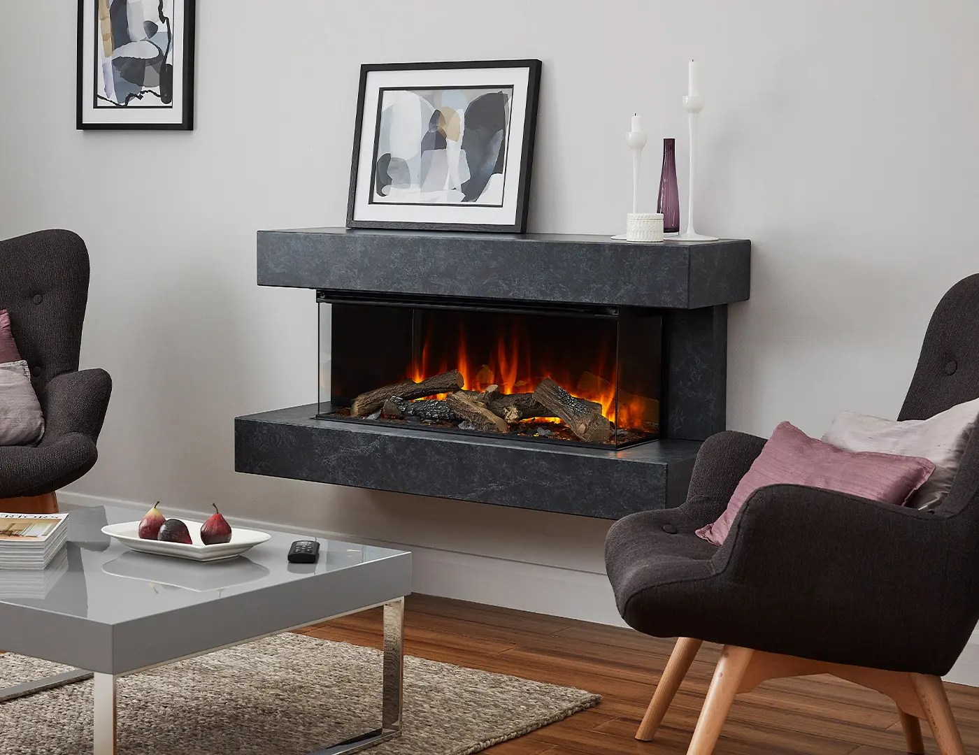 Wall-mounted electric fireplace in a black marble stone finish