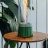 Höfats SPIN Air 1200 – Grüner Tisch-Bio-Kamin mit hohem zylindrischem Glas